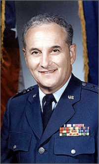 Image of a uniformed member, a past director of D-I-A