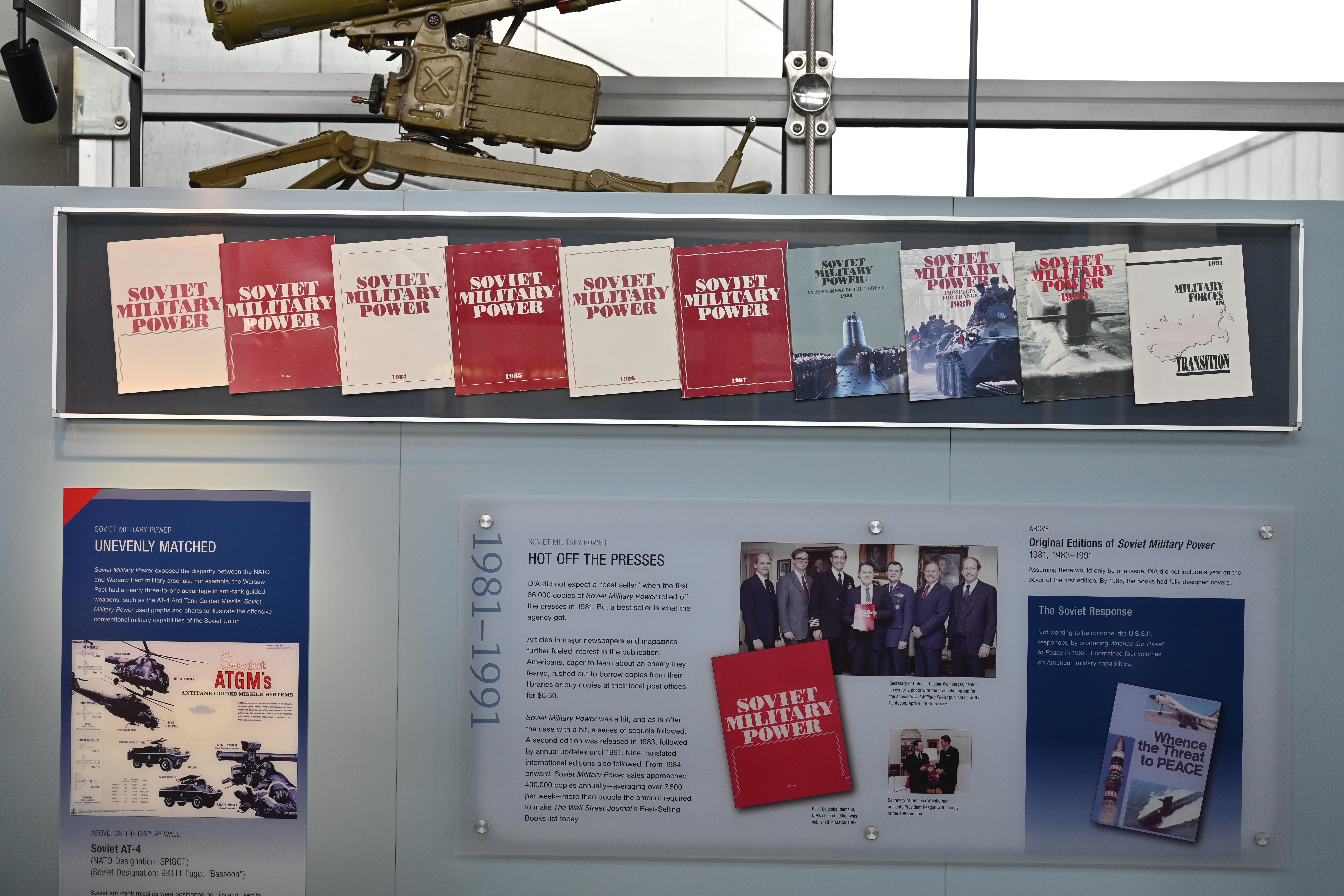 Image of the Soviet Military Power display in the Museum with previous prints of publications and informational text sections.