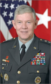 Image of a uniformed member, a past director of D-I-A