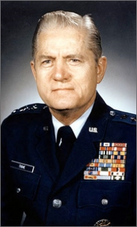 Image of a uniformed member, a past director of D-I-A