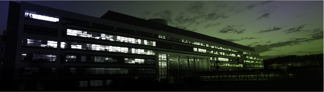 Image of large building at night.