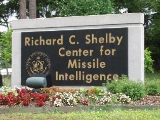 Image of cement sign with label. Richard C. Shelby. Center for Missile Intelligence.