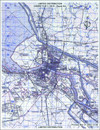 A limited distribution topographical map from March 31, 2003, showing the city layout and surrounding terrain, used for planning military operations.
