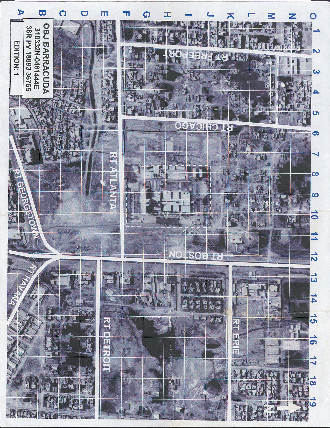 A limited distribution topographical map from March 31, 2003, showing the city layout and surrounding terrain, used for planning military operations.