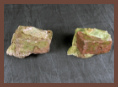 The two halves of a rock-like concealment device are shown separated, revealing the hollow interior.