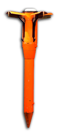 A prototype of the Steel Eagle munition is shown vertically against a black background. The bright orange device has a sharp, pointed tip for ground penetration and a set of folded fins near the top.