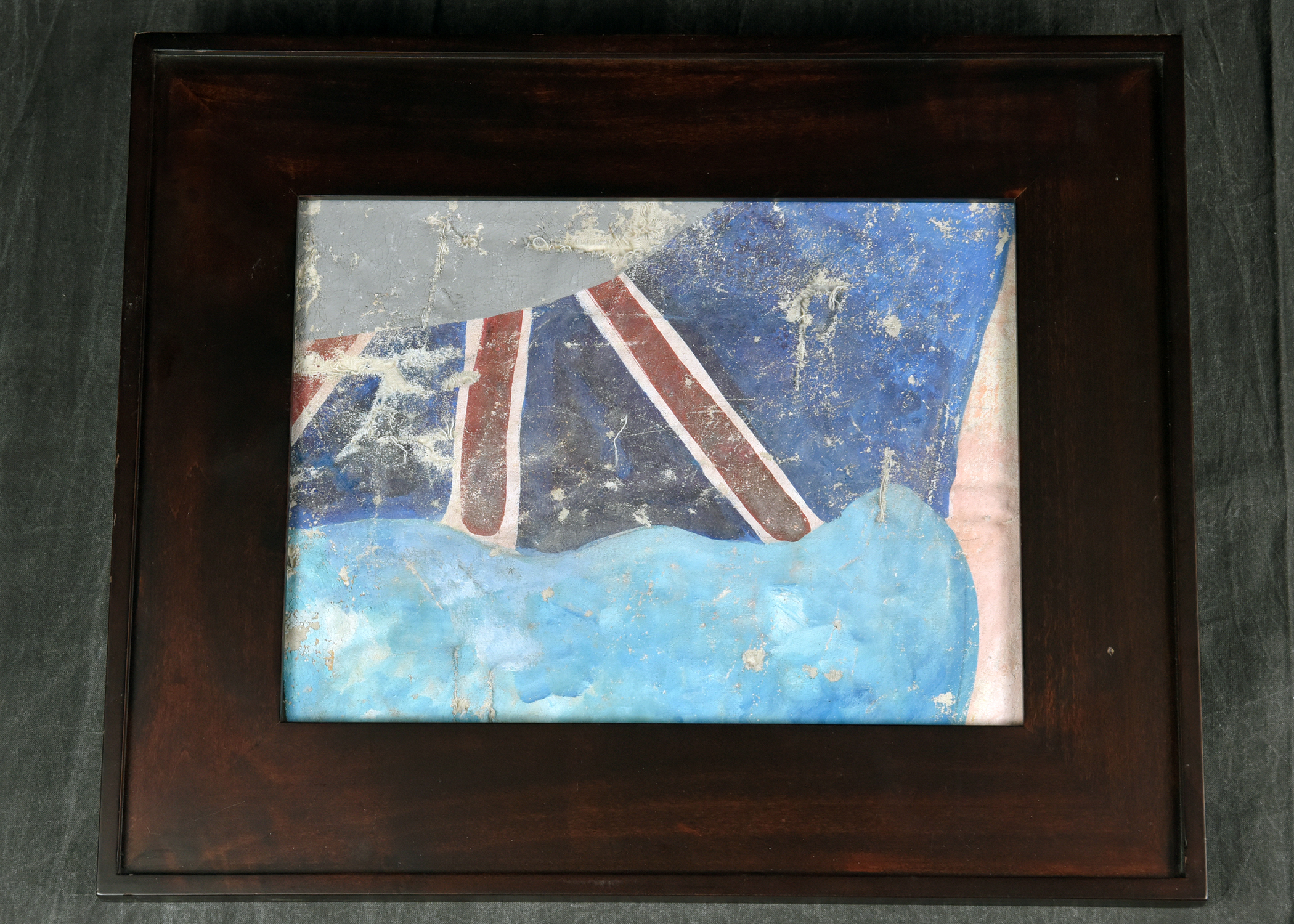 Image of a British flag on a larger painting.