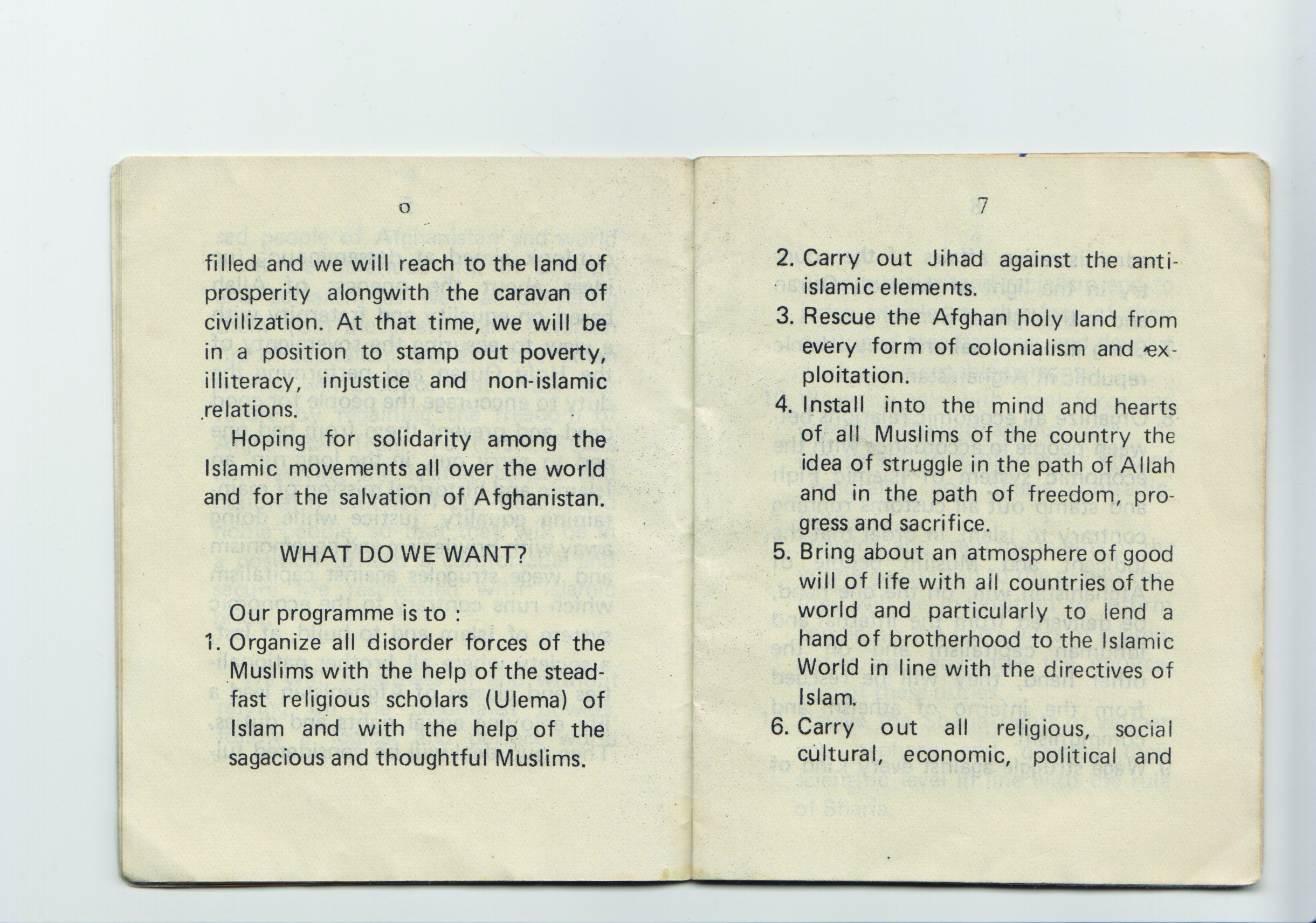 Image of an open small off-white book with black text in English.