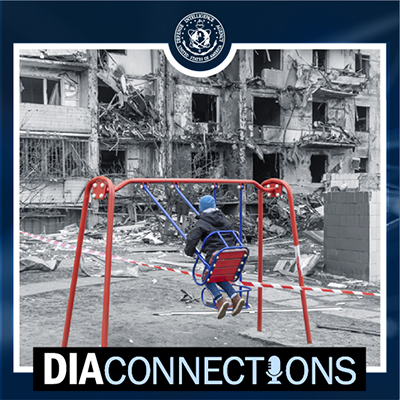 Image of a blue background with a title. D.I.A. Connections. Subtitle. Season 3. Episode 2. With text below that reads. Ukraine. Children of War. And a button that reads. Listen Now. On the right half of the image is a black and white scene of a war-torn Ukraine residential area. In the foreground is a red-colored swingset with boy swinging. To the right. Caution tape is strung with wreckage on the other side.